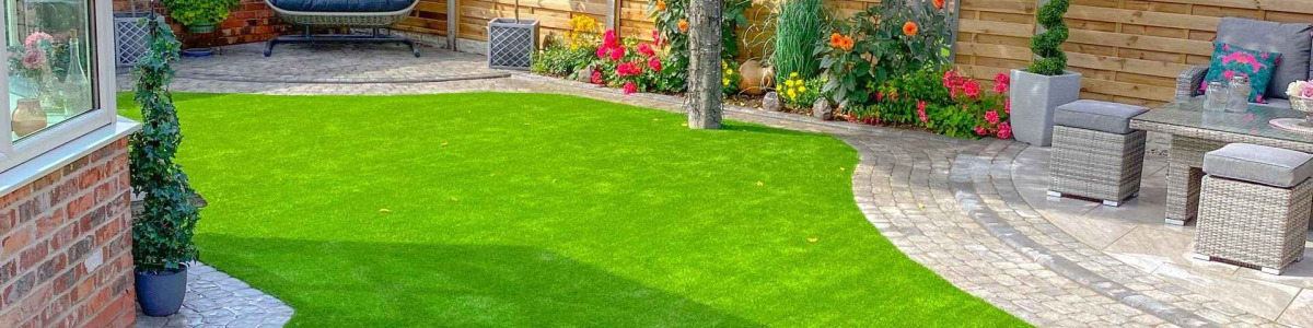 Why did the RHS Ban Artificial Grass at the Chelsea Flower Show in 2022?